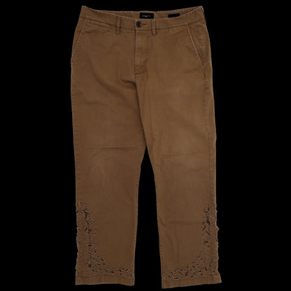 STRESSED BROWN JEANS